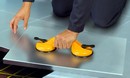 Hand Vacuum Lifter handles loads safely using suction cups.