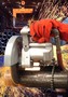 Air-Powered Saw has chain-mount bracket for fast setup.