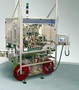Shrinksealer handles up to 500 containers/min.
