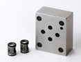 Check Valve Module features reversible orientation.