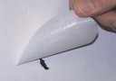 Oval-Shaped Patch repairs holes in web for paper mills.