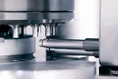 Spray Gun Module coats and lubricates tablet surfaces.