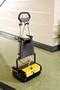 Floor Scrubber cleans hard surfaces and carpets.