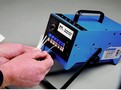 Pneumatic Wire Stripper processes 2,200 wires/hour.