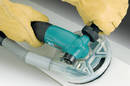 Right-Angle Disc Sander diverts debris to vacuum source.