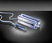 Sensors detect position of pistons in pneumatic cylinders.