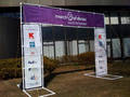 Banner Stand provides outdoor event visibility.