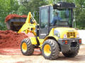 Compact Wheel Loader offers max dump height of 8 ft, 1 in.