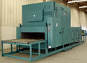 Conveyorized Tunnel Oven is electrically heated to 350°F.