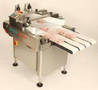Multi-Lane, Switchable Converger offers multi-lingual HMI.