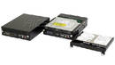 Computer Hard Drive integrates 7 devices into 5.25 in. unit.