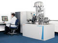 Spectrometer performs chemical surface characterization.