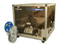 Auto Placer mounts chips on cut strips of taped parts.
