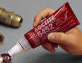 Thread Sealant secures metal fittings in power systems.