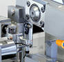 Pinch/Peel Grinder optimizes concentricity on long/thin parts.