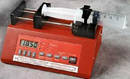 Microfluidics Syringe Pump accepts .5 µl to 140 ml syringes.