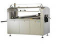 Wave Soldering Machine includes finger conveyor.