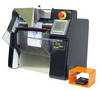 Tabletop Rollbag System automatically fills and seals bags.