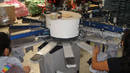Screen Printing Press accelerates garment label production.