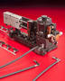 Ignition Wire Terminal Applicator processes 3,500 terminals/hr.
