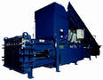 Horizontal Baler features semi-automatic wire feeder.