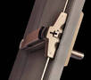 Exit Device Latching System features storm resistant design.