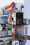 Machine Shields protect milling operators from chips, coolant.