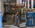 Liquid Vacuum features110 gal drum.