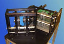 
Adjustable Blade Cartridge for Singulating PCB Carrier Strips 
