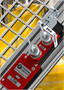 Extracted Key Adapter restricts access to moving machinery.