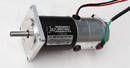 Reversible DC Motor features integral analog tachometer.