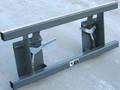 Skid Steer Adapter targets standard pin-on loaders.