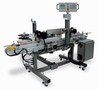Labeling System applies labels to oblong and round bottles.