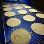 Conveyor Belt is engineered to cool tortillas.