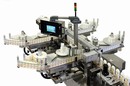 Labeling Machinery handles up to 300 containers/min.