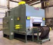 Conveyor Oven performs stress relief on locking wheel hubs.