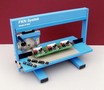 Depanelizer separates PCBs with tight component spacing.