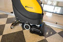 Walk-Behind Scrubber uses less water and chemicals.
