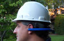 Hardhat Adaptor facilitates use of hearing protection devices.