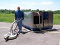 Power Wash System recovers and filters wastewater for reuse.