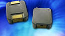 Inductor has pressed powdered iron alloy core construction.
