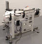 
New, Economical Bottle Labeling System
