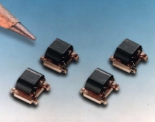 Directional Coupler is wound on dual aperture ferrite cores.