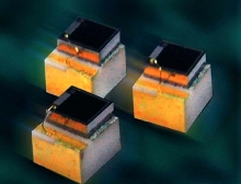 Photodiode monitors output of semiconductor lasers.