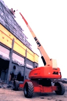 Boom Lift offers controlled arc work envelope.