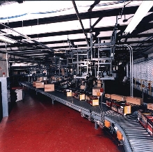 Conveyor handles multi-SKU distribution.