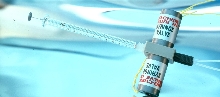 Valve provides precision fluid transfer in syringe system.