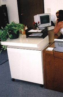 Clean Air Table purifies office environment.