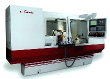 Cylindrical Grinder has dual-wheelhead arrangement.