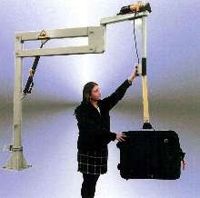 Manipulator lifts and handles large suitcases and boxes.